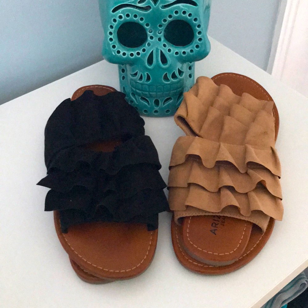 Pair of women’s ruffled faux suede sandals